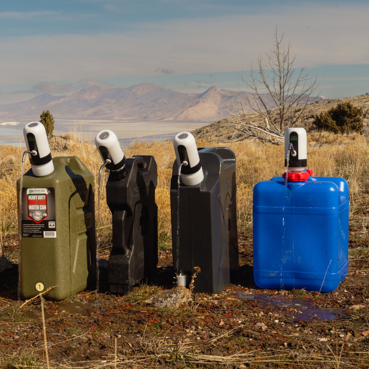 Multiple water containers all using Lone Rock Concepts water pump kits dispensing water