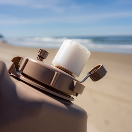 Military adapter on military can at the beach