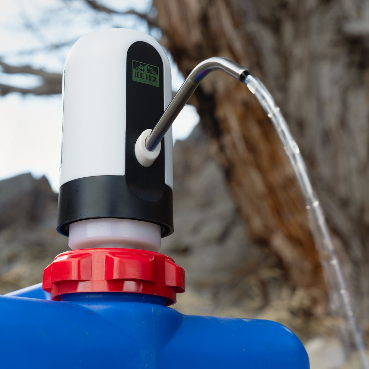 Water pump on Reliance Aqua-Tainer in the woods