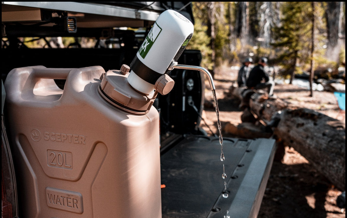 Scepter water pump adater kit on 20L at camp dispensing water
