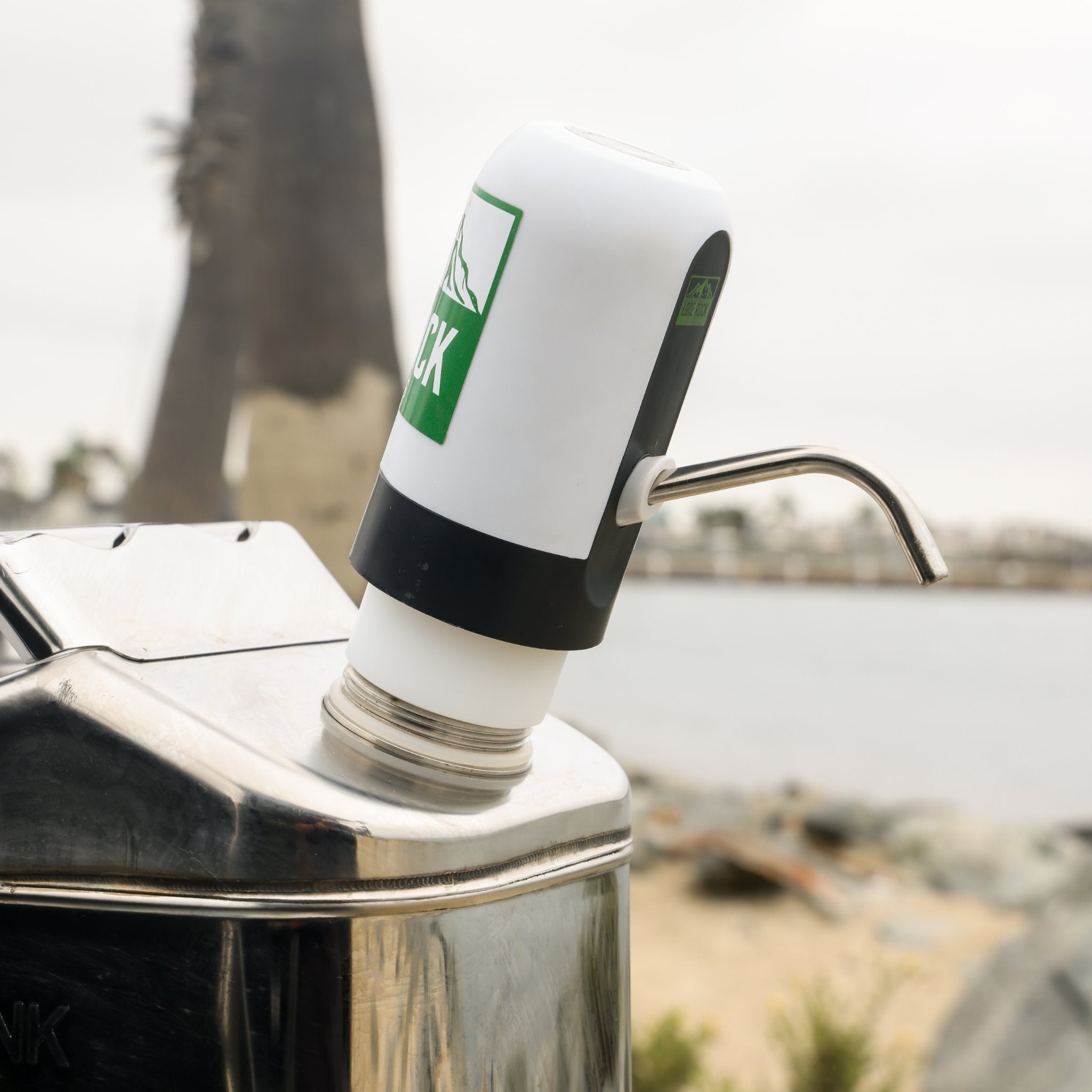 Close up of water pump adapter kit on a Swiss Link water container