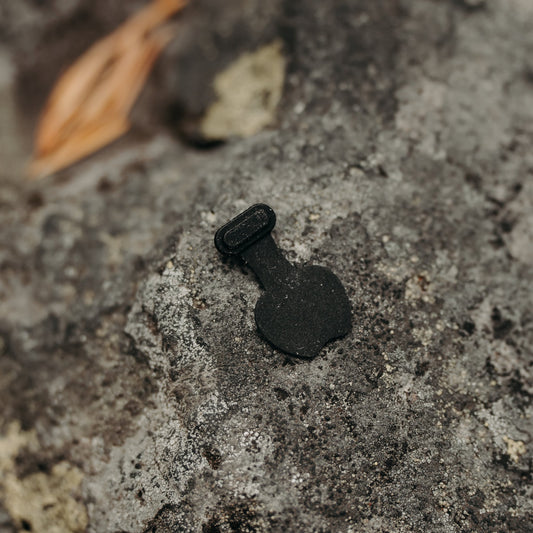 Usb-c dust cover on a rock